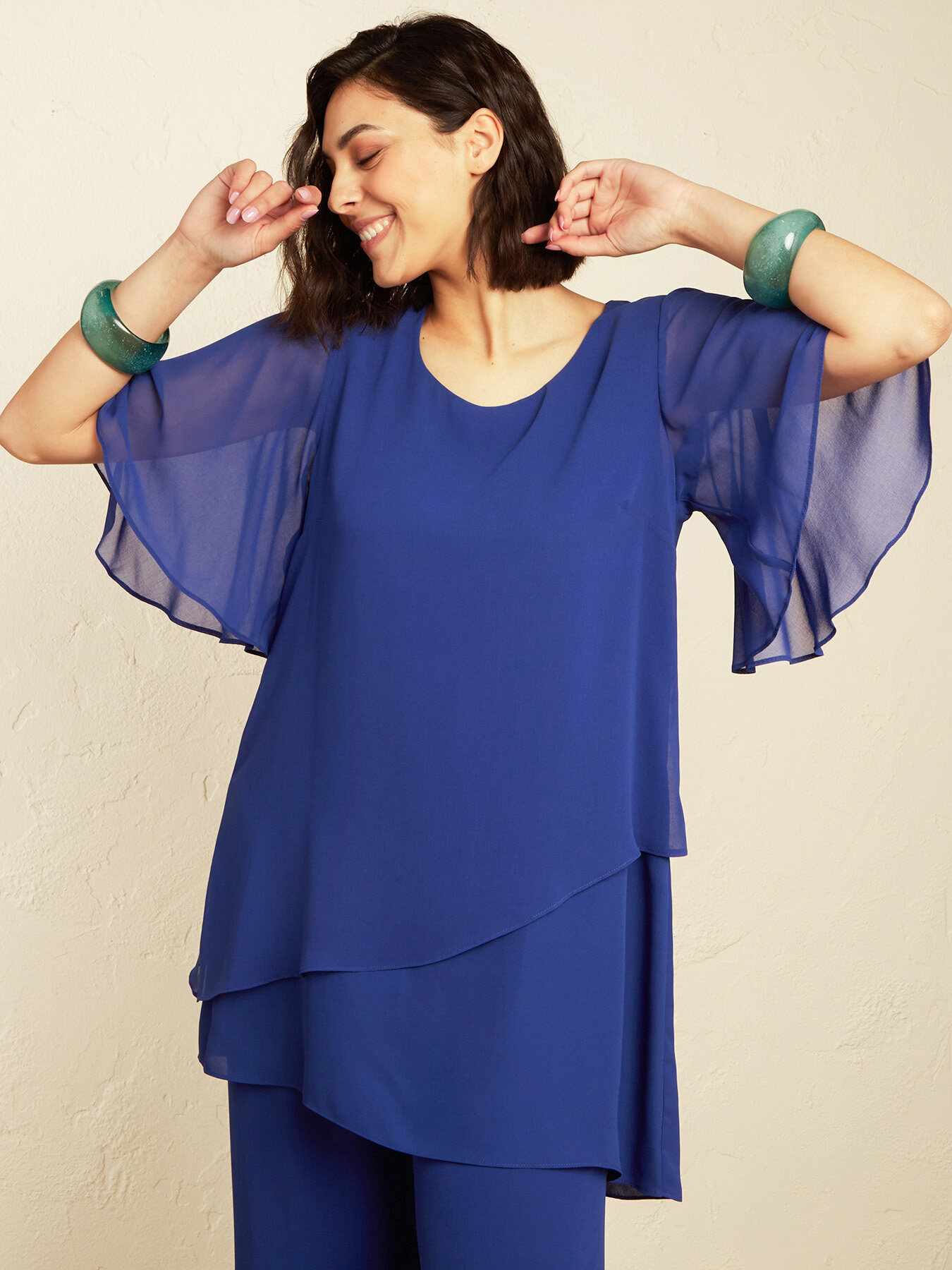 Tunica elegante in georgette