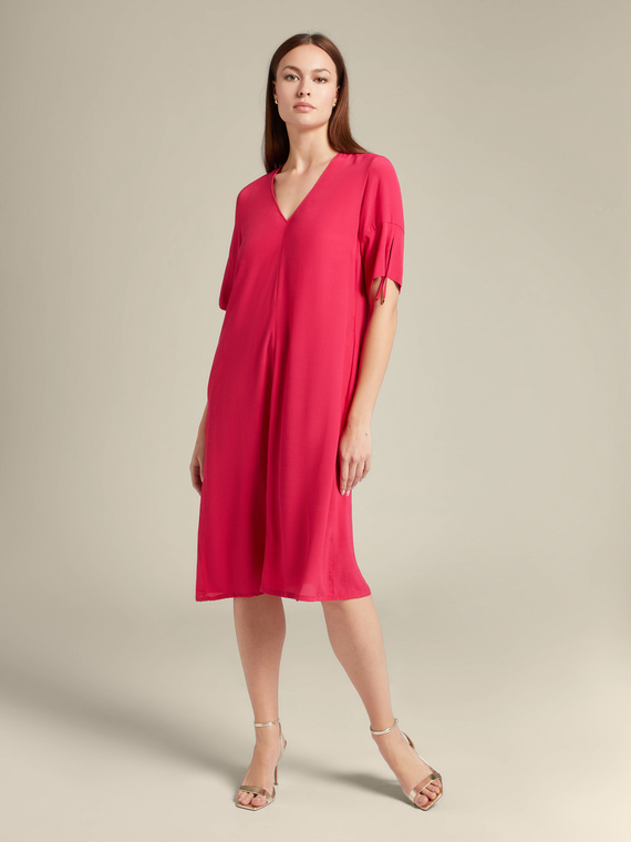 Robe fuchsia à col en V