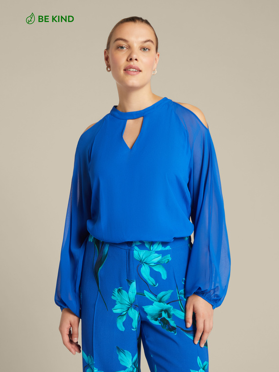 Blouse élégante avec fentes