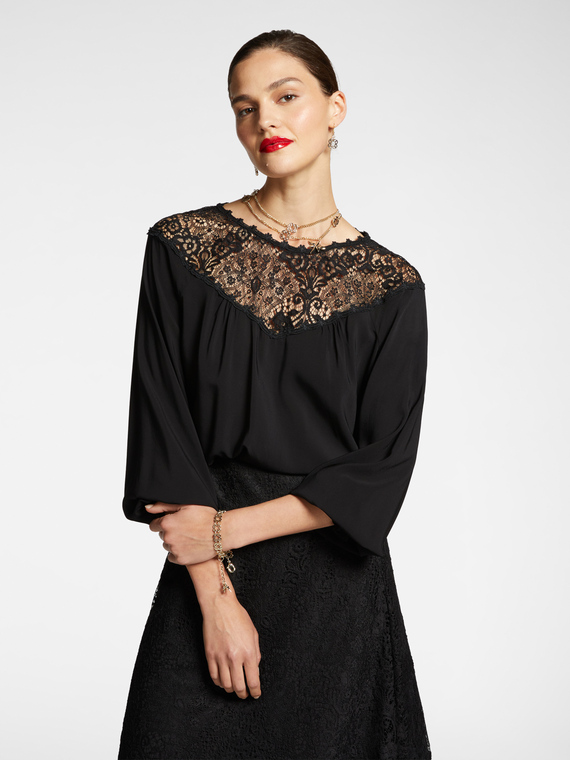 Blusa elegante con pizzo