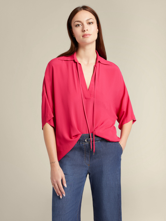 Blouse with strings and V-neck